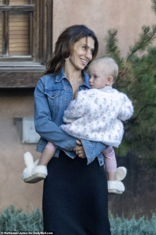 Hilaria Baldwin was all smiles as she held her son in adorable bunny slippers.