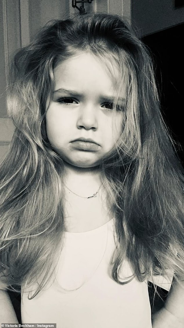 Another black and white snap showed her pouting at the camera as her hair fell in loose waves around her.