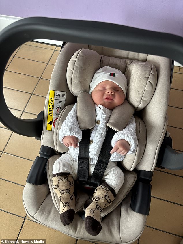 Cove, who is four weeks old, is pictured sleeping in her car seat. Friends who saw the photo of Bromley looking glamorous before her C-section were shocked. 