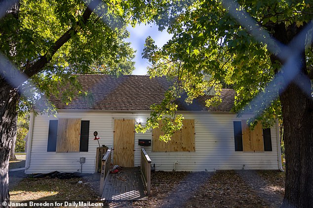 Police have erected a fence around Haslett's run-down rental property, where he allegedly held the woman captive since September.