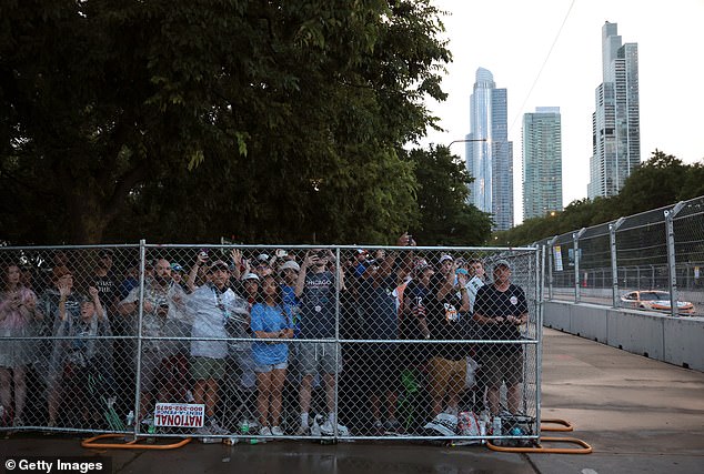 Spectators watch the Grant Park 165 NASCAR Cup Series race at the Chicago Street Course