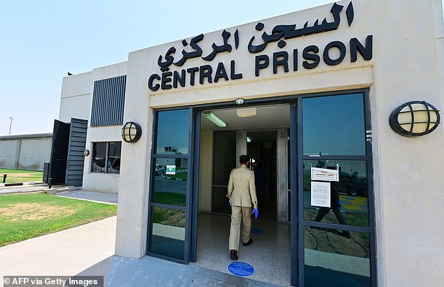 A policeman enters Al-Awir Central Prison in Dubai, United Arab Emirates