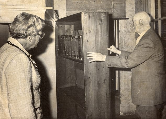 Otto Frank, Anne Frank's father, is pictured showing Queen Juliana of the Netherlands the Frank family's hiding place during World War II. The Queen visited the Anne Frank House in Amsterdam on the occasion of the 50th anniversary of Anne Frank's birth