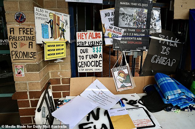 Some of the signs found on the front of the property.