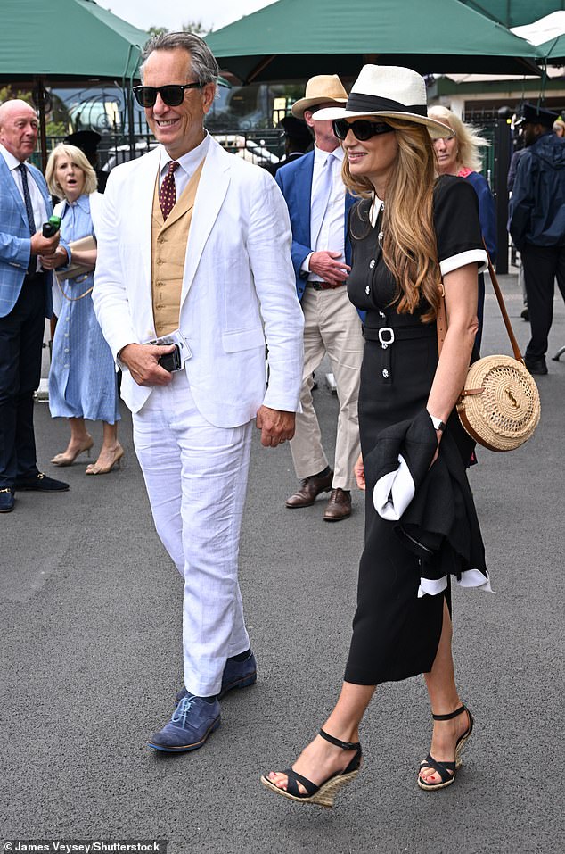 Richard completed the look with a pair of sleek blue suede pumps and sported oversized black sunglasses.