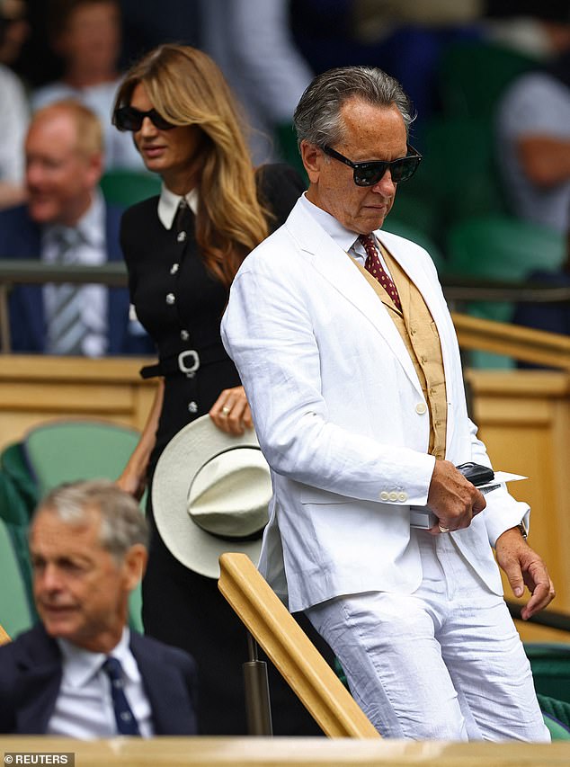 Jemima completed the ensemble with a black and white fedora hat while sporting a pair of oversized black sunglasses.