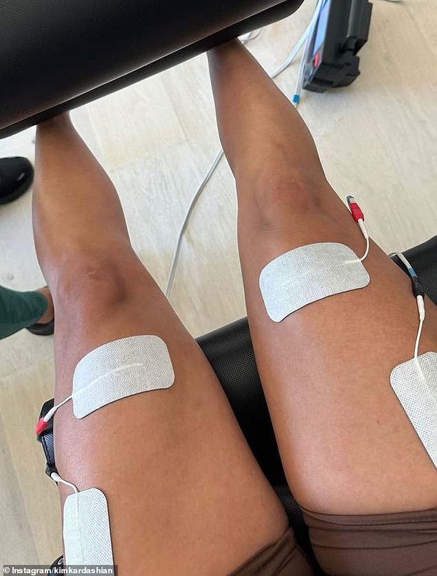 The SKIMS founder uploaded clips and photos in which she appeared to use a form of muscle stimulation on her upper thighs.