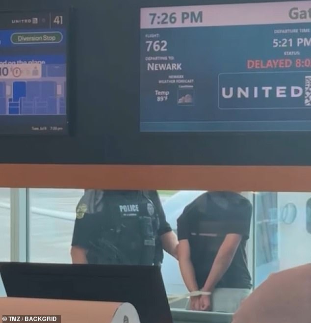 The staff announced that the flight would be delayed in Orlando (pictured) and that the staff would not continue to Newark after all the drama.