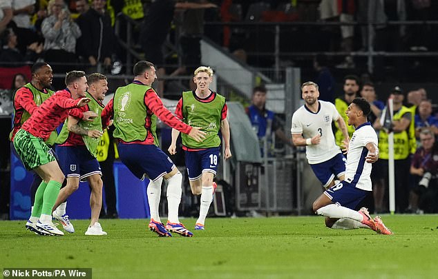 England's substitutes ran onto the pitch to celebrate with their goalscoring hero