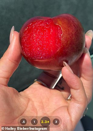 Check out the bite he took out of a juicy pluot.