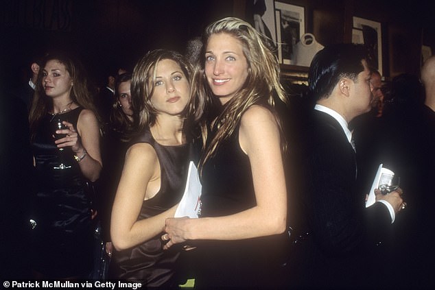 Carolyn, with actress Jennifer Aniston at an event in New York City in January 1990, reluctantly agreed to go on the fatal flight.