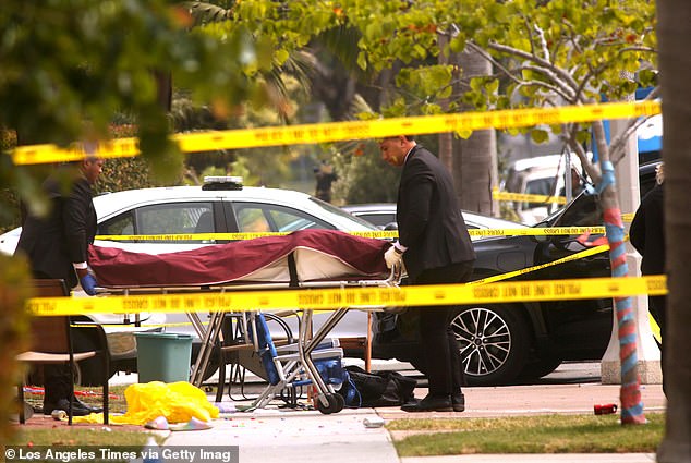 A victim of a random attack is taken away as law enforcement officers investigate the scene at the corner of 16th Street and Pecan Avenue in Huntington Beach.