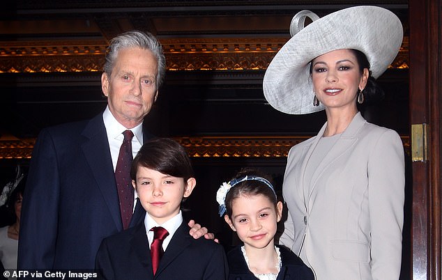 Douglas, his wife Catherine and their children Dylan and Carys photographed in 2011