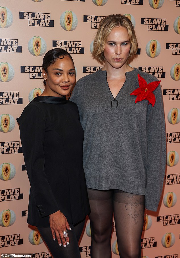 She posed for photographs at the performance with American actress Tommy Dorfman.