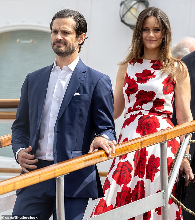 Prince Carl Philip and Princess Sofia are pictured leaving the King's ship, the Norge, after a reception for the Queen of Sweden's 80th birthday in Stockholm in June 2024.