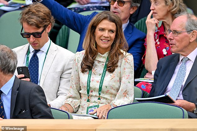 The presenter seemed to be in a very good mood as she waited for the semi-final match to begin.