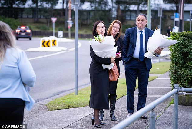 Deputy Premier Prue Car arrives to join community members at a community vigil at Chifley Park in Lalor Park in Sydney's west.