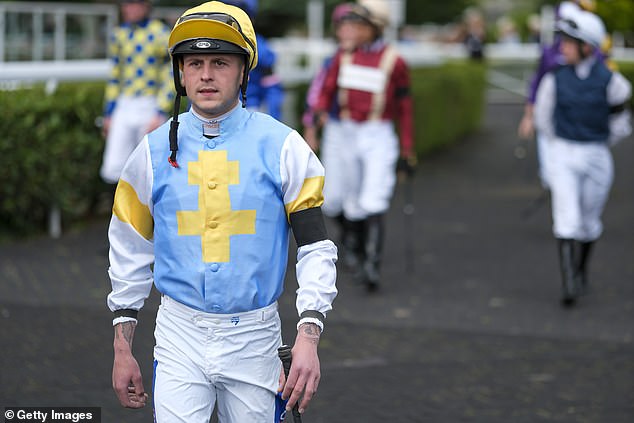 Jockeys wore black armbands yesterday at Kempton Park Racecourse as a mark of respect for John Hunt