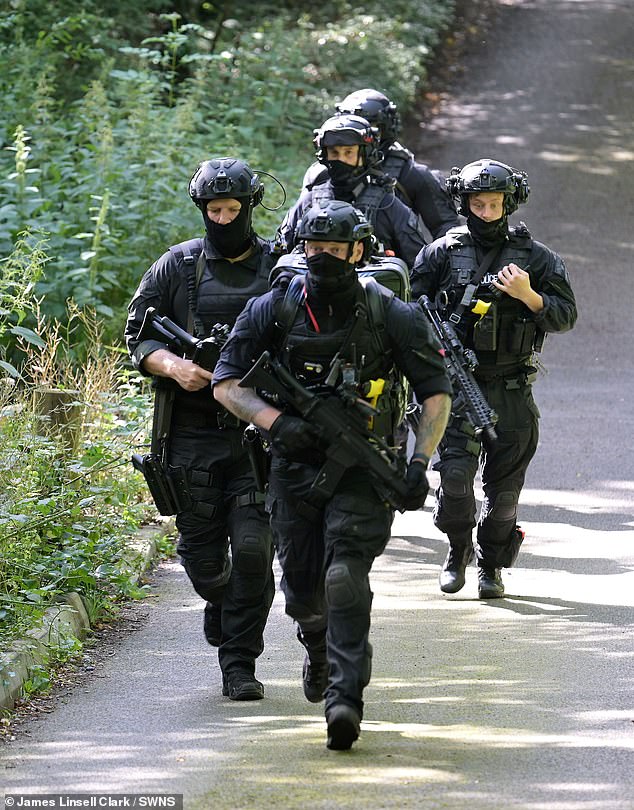 Armed police carrying firearms entered Lavender Hill Cemetery in Enfield on Wednesday afternoon