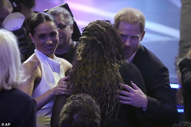 The Duchess chose to show off her tanned shoulders at the ESPY Awards by slicking her hair back into a sleek low bun.