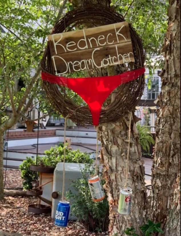 A 'redneck dreamcatcher' made from a wooden wreath, beer cans and panties