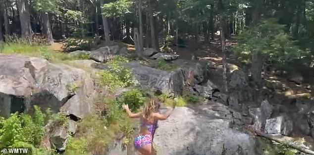 The rocks sit 30 feet above the Mousam River and often see daredevil swimmers splashing around.