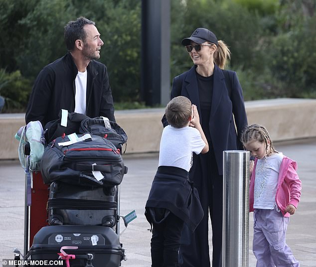 She looked as dapper as ever in a sleek black blazer paired with a matching tee and baggy trousers.