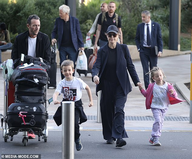 The Channel Nine star completed her look with black sneakers and accessorised her look with a matching baseball cap, a gold necklace and stylish sunglasses.