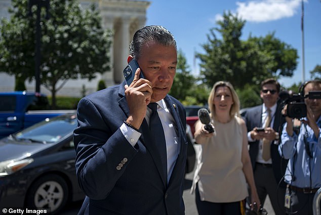 Sen. Alex Padilla, D-Calif., rushed into the meeting to avoid questions while taking a call.