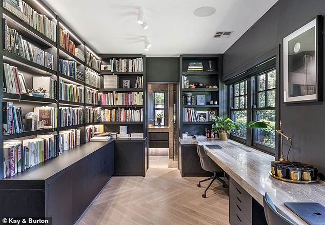 According to Herald Sun sources, the property is still for sale and has managed to attract interest from overseas buyers. Pictured: the private study and library