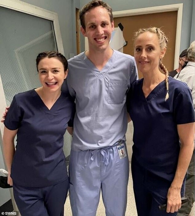 Bergin (center) is pictured with Caterina Scorsone, who plays Dr. Amelia Shepherd (left) and Kim Raver, who plays Dr. Teddy Altman (right) on the sets.