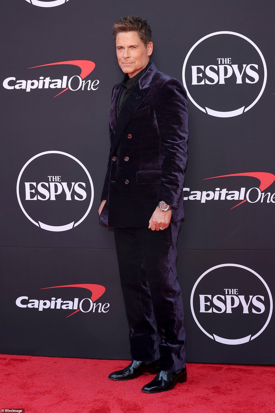 Rob Lowe wore an intriguing crushed purple velvet suit, but missed the opportunity to lighten up the dark look by wearing a black shirt.