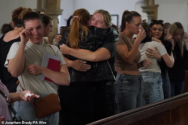 Members of the congregation attending a service at St James's Church in Bushey yesterday