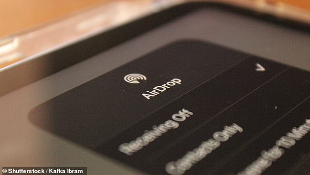 The woman saw an alert that an AirDrop of a nude photo she had on her phone had failed (file image in photo)