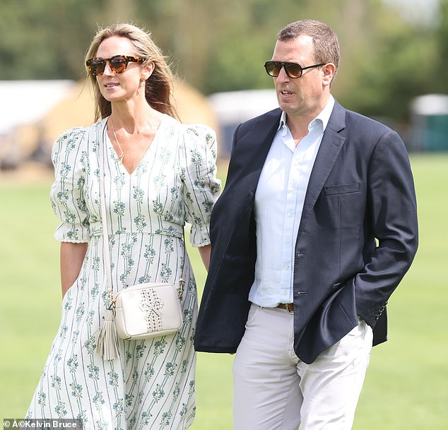 The couple looked very affectionate as they walked hand-in-hand at the Out-Sourcing Inc Royal Charity Polo Cup at the Guards Polo Club in Windsor in aid of 11 different charities supported by both the Prince and Princess of Wales.