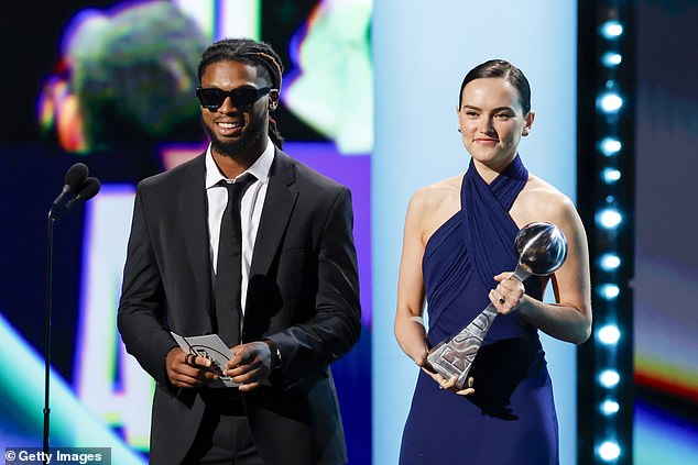 Damar Hamlin and Daisy Ridley speak onstage during the 2024 ESPY Awards