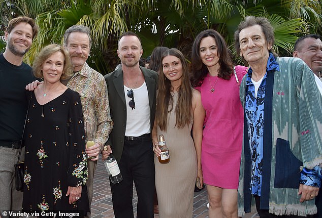 As an accessory, Sally looked fabulous in tinted sunglasses and a gold necklace (pictured with guest Robin Dearden, Bryan, Aaron, Lauren Parsekian).