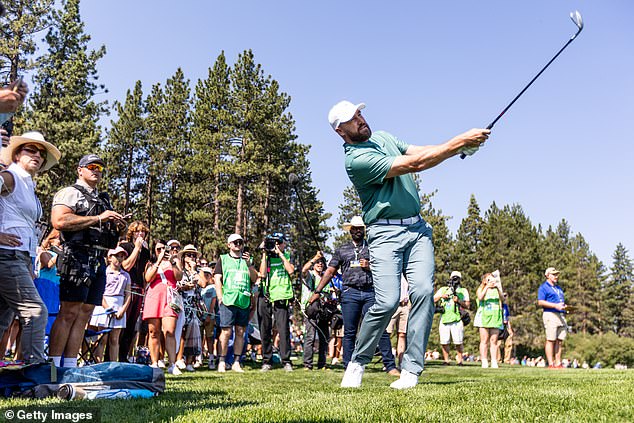 Kelce hits his tee shot on the first hole on day one of the 2024 American Century Championship