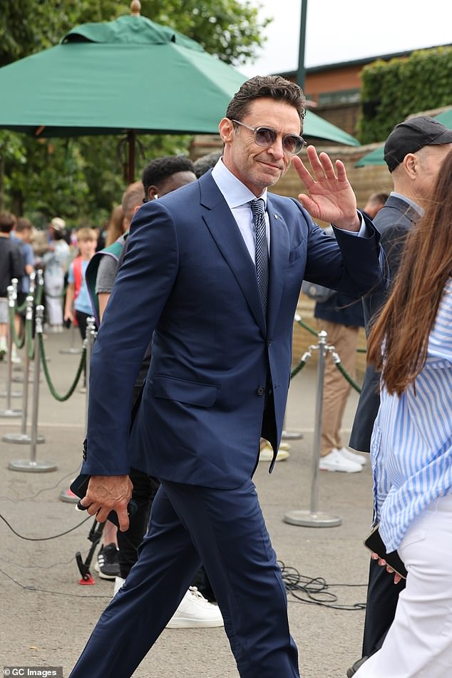 Hugh Jackman greeted fans upon his arrival for the 13th