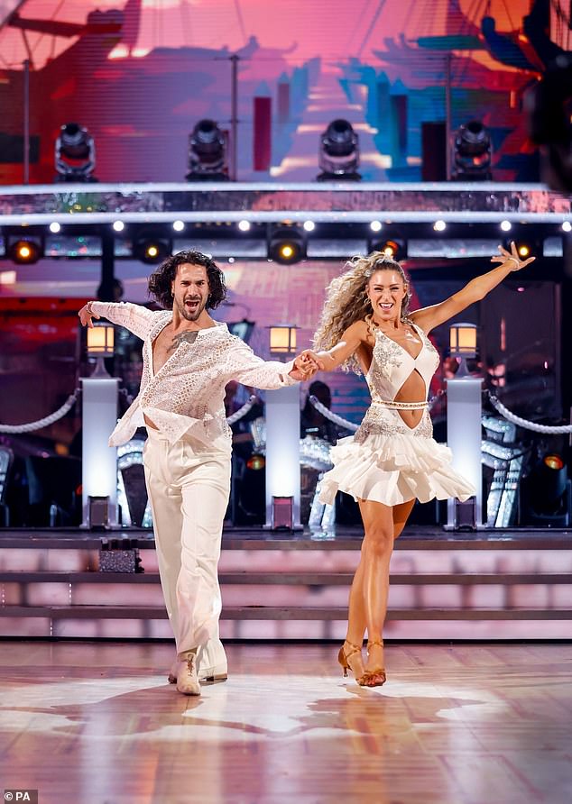 Zara McDermott (right) and Graziano Di Prime dance in matching white outfits during a dress rehearsal for the BBC show.