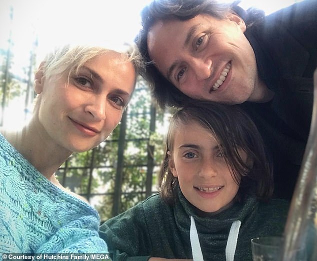 Matthew Hutchins, who was married to victim Halyna Hutchins for 16 years (pictured with their son Andros), said in a statement after the shocking ruling that he hopes 