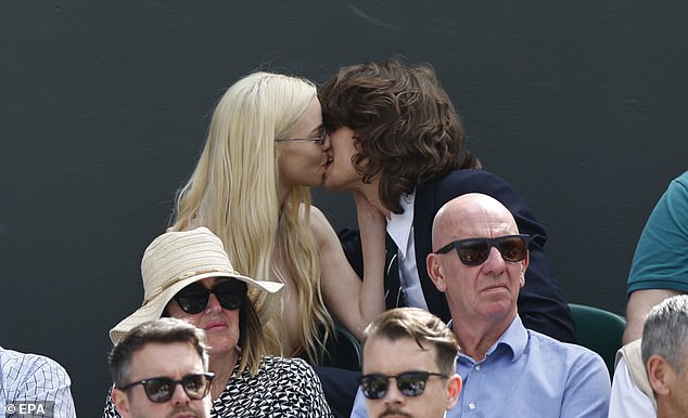 The couple was also seen sharing a sweet kiss during the intense final match.