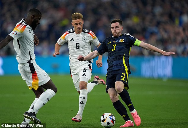 Germany's Antonio Rudiger (left) and Joshua Kimmich (centre) defended superbly at the Euros