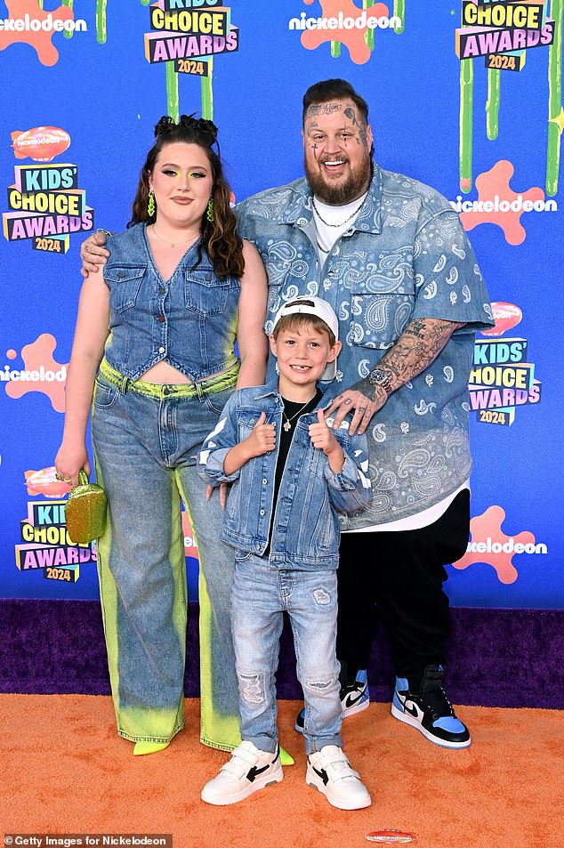 She coordinated with her daughter Bailee Ann, 16, and son Noah Buddy, 8, dressed in denim attire for the Saturday night ceremony.