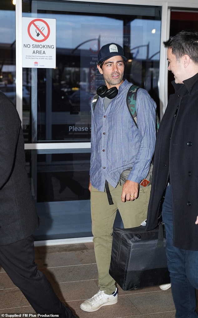 The Devil Wears Prada star looked comfortable and casual in a blue button-down shirt and khaki chinos.