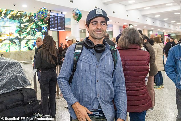 Grenier, who is in Australia to film content for a documentary, also wore a blue baseball cap.