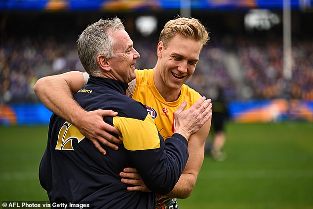 The 2018 championship-winning coach hugged his fans for the last time