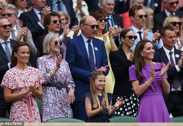 The future queen was greeted with a standing ovation as she prepared to watch the tennis match.