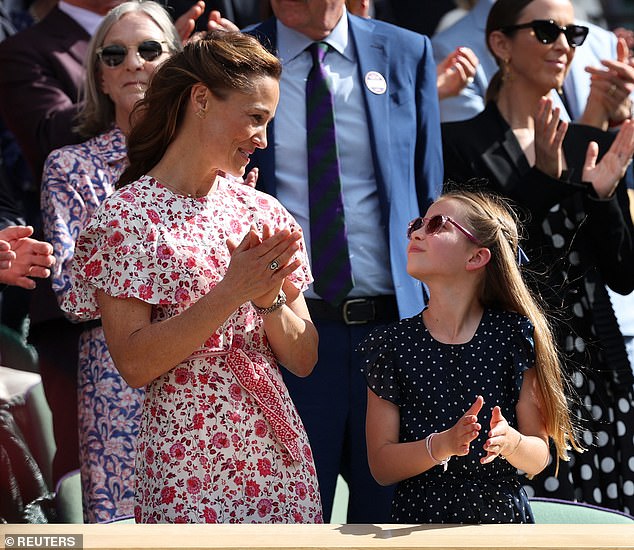 During the standing ovation the finalists received, Pippa and Charlotte were seen smiling at each other from the front row of the royal box.