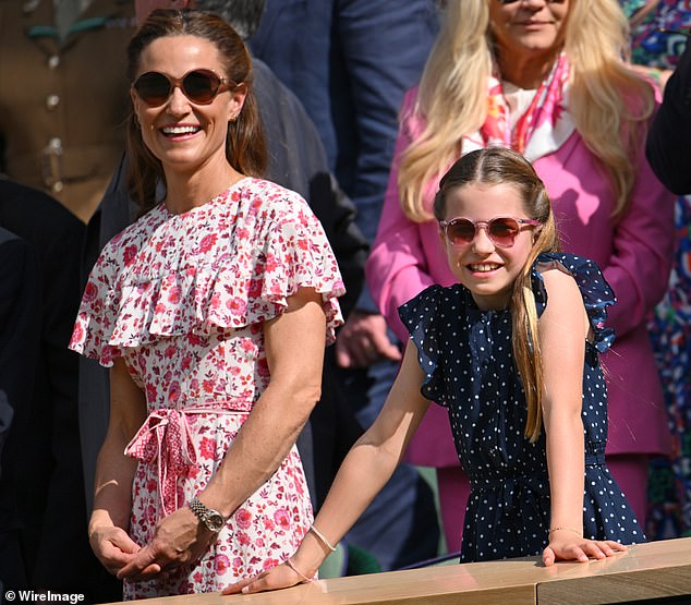 Pippa looked effortlessly chic in a fitted red midi dress with floral detailing and ruffled tiers, while Charlotte wore a polka dot dress by Guess.